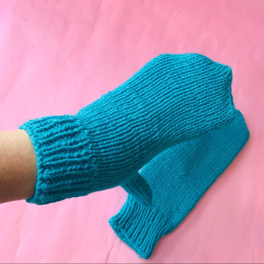New turquoise hand knitted wool mittens
